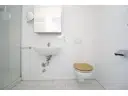 Gäste-WC mit bodentiefer Dusche - Bild 2