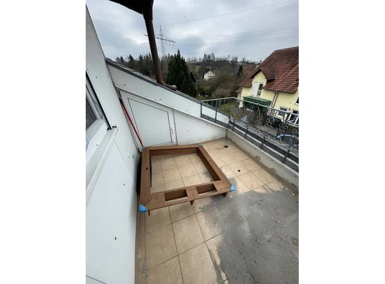 22 Balkon mit Sandkasten