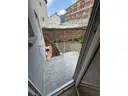 21 Balkon mit Treppe zum Garten und Stellplatz