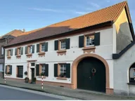 Titelbild für Dieses liebevoll erhaltene **Fachwerkhaus mit Einliegerwohnung** aus dem Jahr **1742**