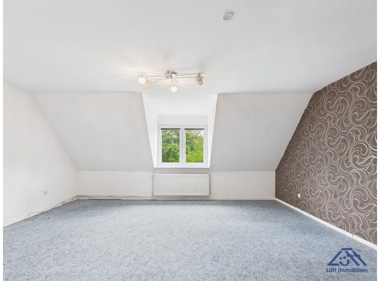 Zimmer DG - Lütt Immobilien - Selent.jpg