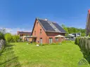 Blick Garten zum Haus - Lütt Immobilien Selent