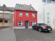 Titelbild für Das um 1900 erbaute Reihenmittelhaus wurde 2006 von den heutigen