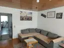7 WoZi mit Blick in Flur und Küche